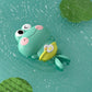 Jouet de bain couleur vert grenouilles 