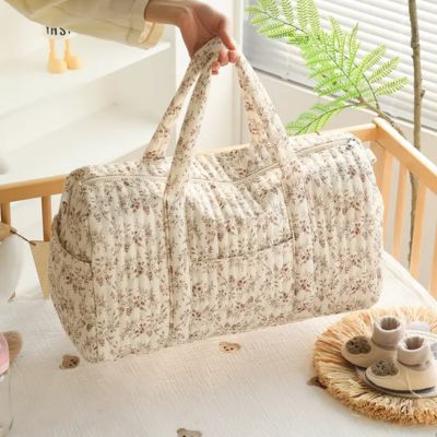 Sac à langer pratique pour transporter les affaires de bébé