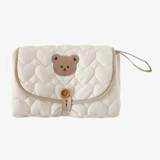 Tapis à langer nomade 