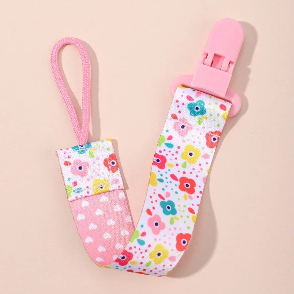 attache tetine personnalisable avec des fleurs